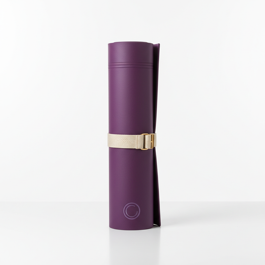 Premium purple yoga mat rolled up